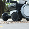 Fauteuil électrique robuste pour adulte avec roues omnidirectionnelles sécurisées